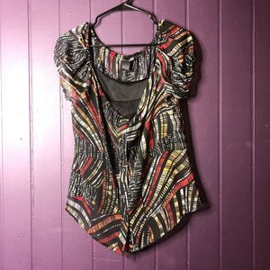 Button up blouse with puff sleeves.